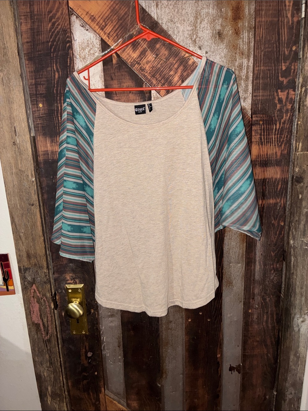 Cruel Girl Cream Top with Teal and Blue Striped Dolman Sleeves